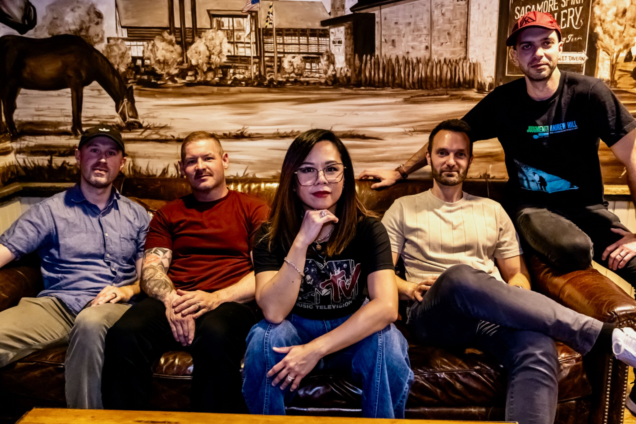 The five members of District Stereo together